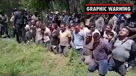 rival gang member flayed tortured and beheaded|Disturbing video shows Mexican cartel lining up rivals for mass .